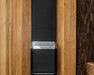 Saunum Air 5 black climate equalizer column mounted on a cedar plank sauna wall
