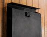 Detail of the Saunum Air 5 black equalizer column top with logo emblem and steam