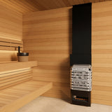Saunum Air 5 heater and equalizer column installed beside light cedar sauna benches
