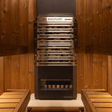Saunum Air heater front view with stainless stone basket between two cedar benches