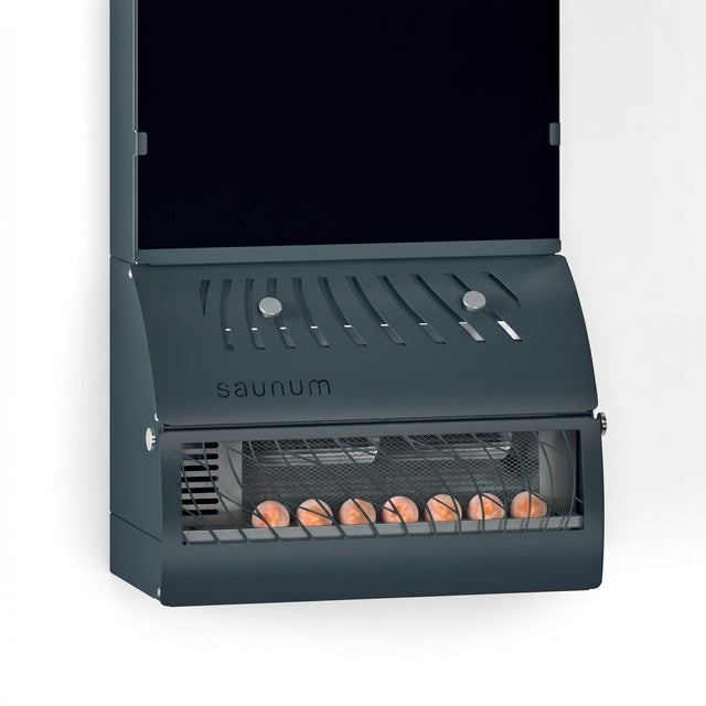 Saunum AirSolo 80 open unit showing fan louvers and glowing heater stones