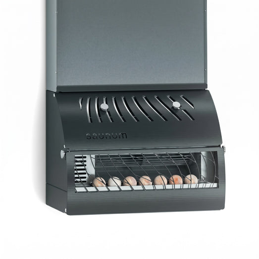 Saunum AirSolo Wall equalizer with open lower vent showing heated stones