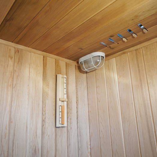 SunRay Aston 200TN corner light and wall thermometer in cedar interior
