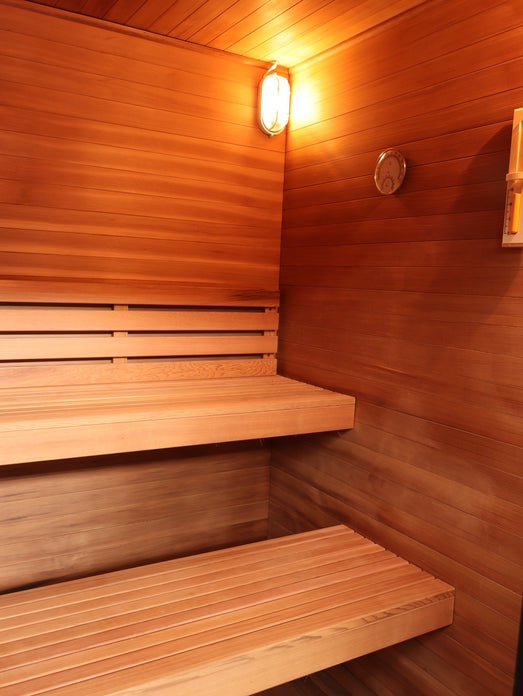 Upper and lower bench and dome light inside the SunRay Cayman
