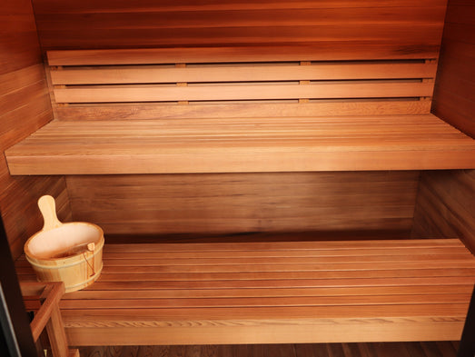 Upper and lower benches inside the SunRay Cayman with bucket and ladle