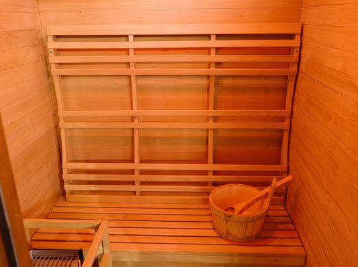 SunRay Eagle sauna bench and slatted backrest with a wooden bucket and ladle