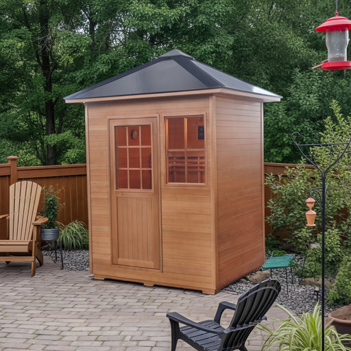 SunRay Freeport 3-person outdoor traditional sauna with black metal roof on a backyard paver patio