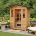 SunRay Grandby 300D3 outdoor sauna set in a lush garden patio