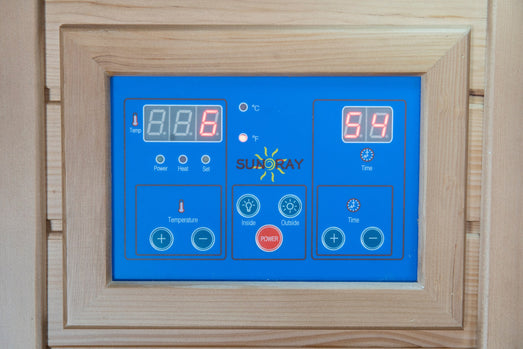 Blue digital control keypad on the exterior of the SunRay Sedona infrared sauna