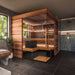 ThermaSol Astra indoor sauna in a tiled bathroom with warm interior lighting