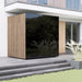 ThermaSol Spectra outdoor sauna cabin beside a modern house and lawn