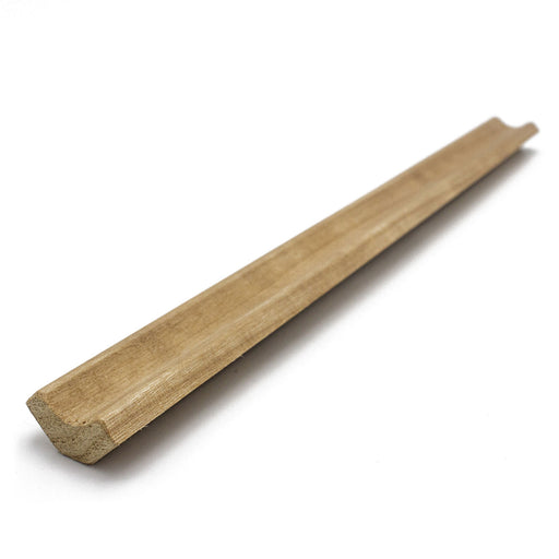 Thermo-Aspen 1x2 Inside Corner Trim piece lying at an angle, showing the notched groove along its length