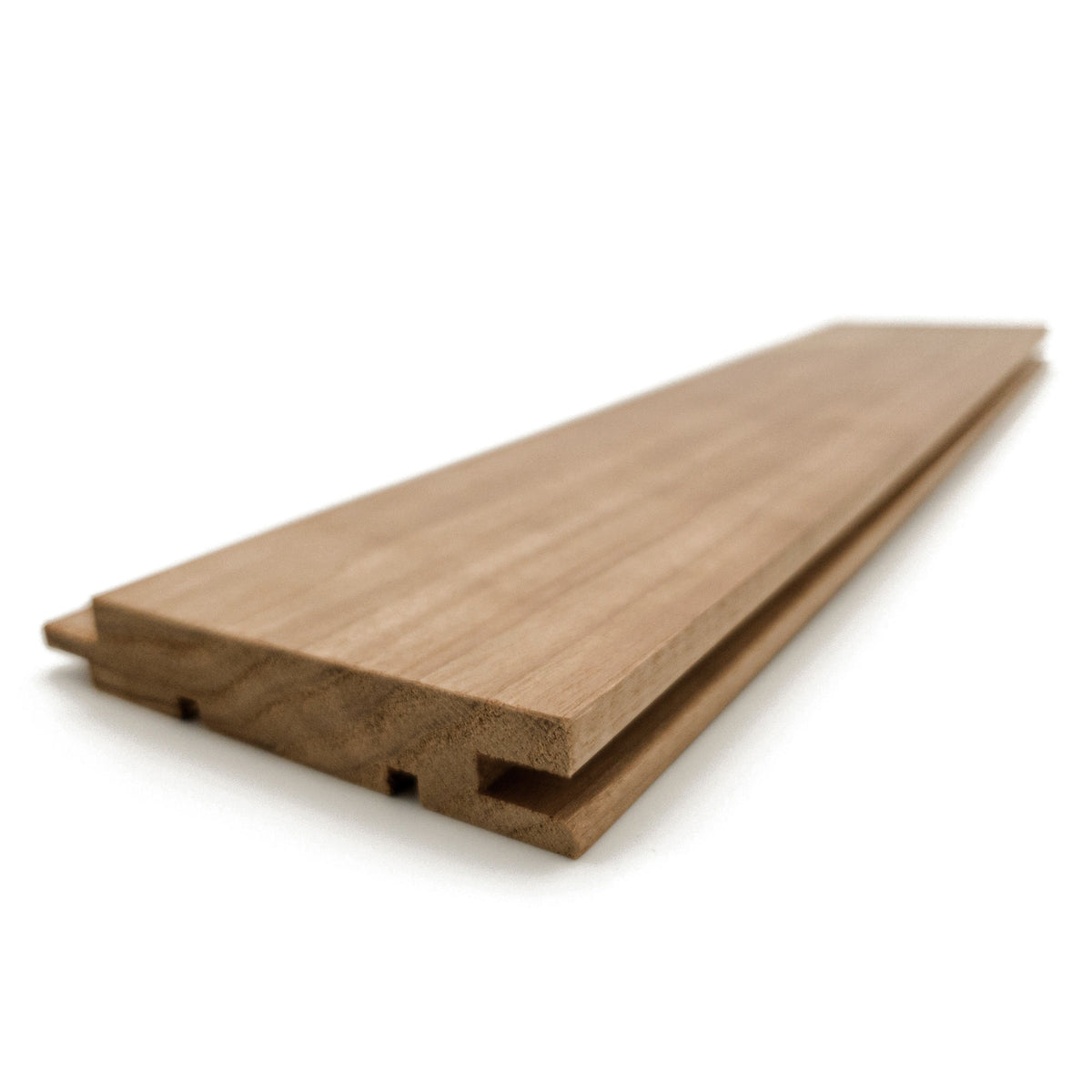 Thermo-Aspen 1x4 tongue-and-groove paneling board at an angle, showing the face and grooved edge profile