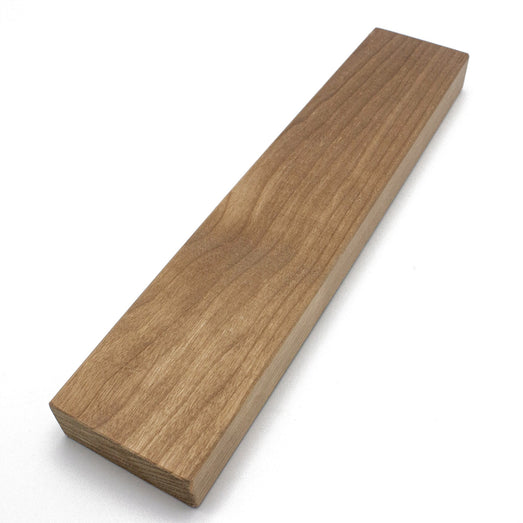 Thermo-Aspen 2x3 bench board at an angle on white, showing the wide face grain and one end