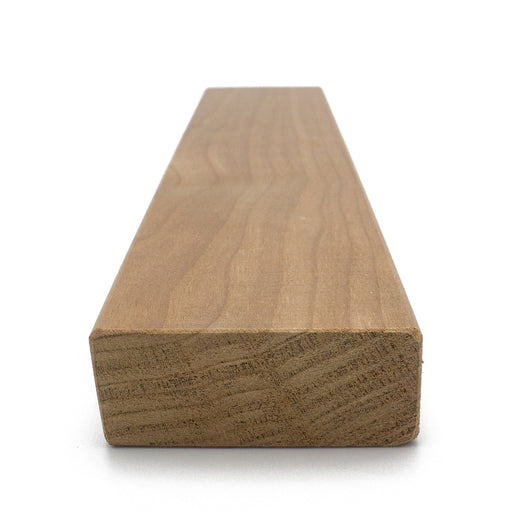 Thermo-Aspen 2x3 bench board end view, with the cross-section grain in front and the face stretching back