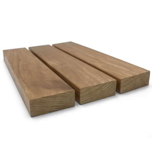 Three Thermo-Aspen 2x3 bench boards side by side, angled to show the end grain and top faces