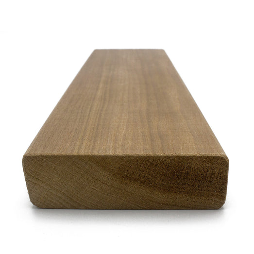 Thermo-Aspen 2x4 bench board end view with rounded edges, face grain receding behind