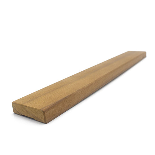 Thermo-Radiata Pine 1x2 Door Trim piece, angled view showing the face grain and the long edge