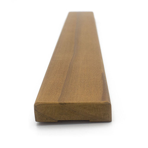 Thermo-Radiata Pine 1x2 Door Trim piece, end view showing the cut profile with a small groove on the underside
