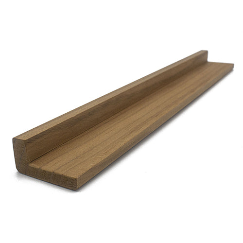 Thermo-Radiata Pine 1x2 Outside Corner Trim piece, angled view showing the L-shaped profile and long grain