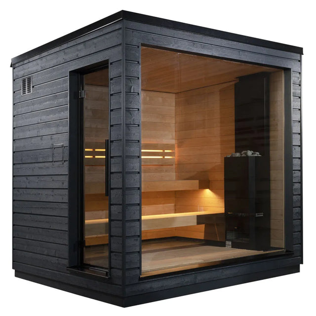 Studio three-quarter view of the SaunaLife G6 outdoor sauna cabin, black-painted Thermo-Pine outside with a full corner wall of glass showing the two-tier Thermo-Aspen benching and the heater position inside.